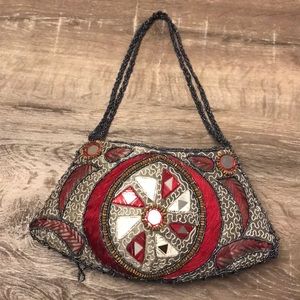 Brand New embroidered bag with mirrors.